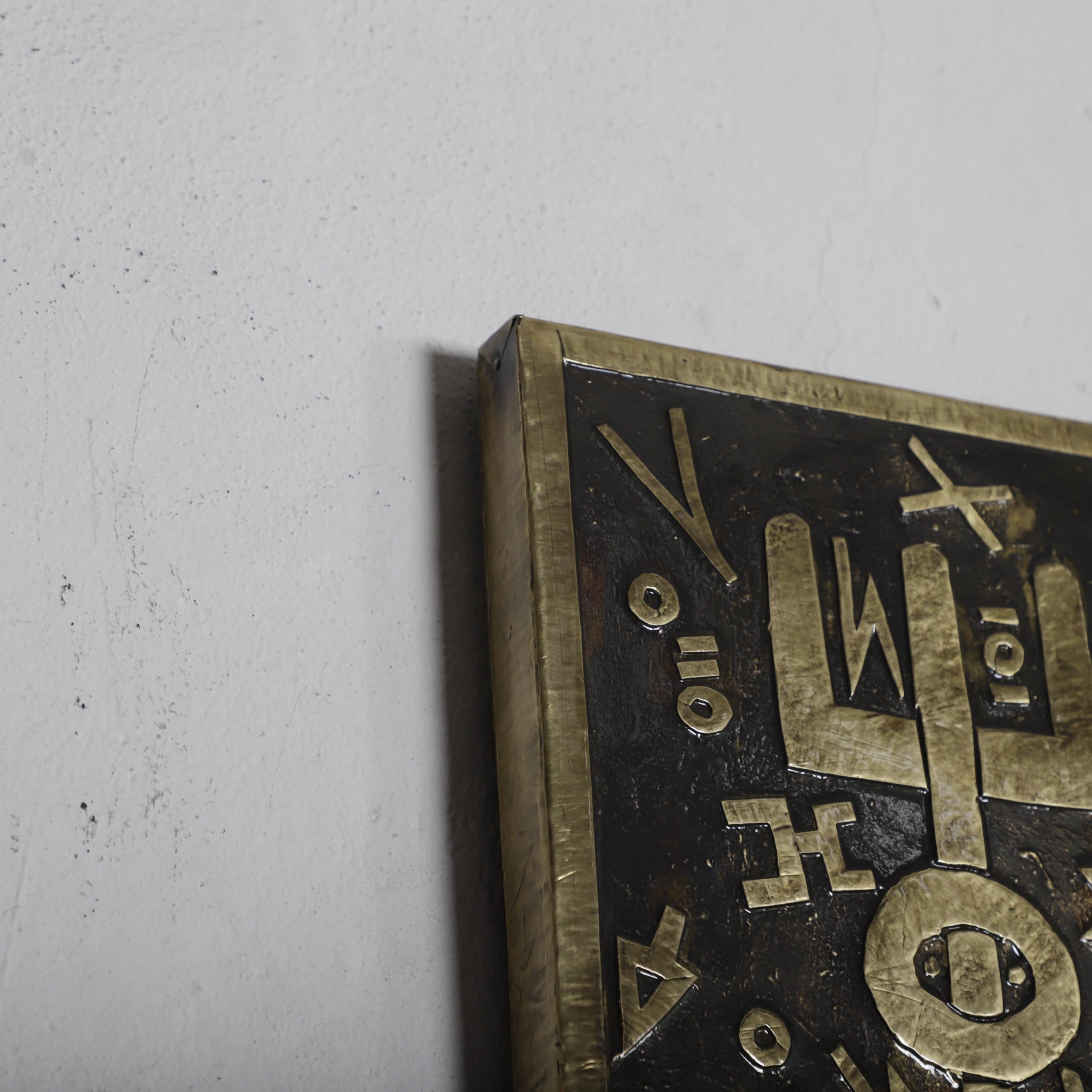 Abstract Brass Wall Art – Tribal Symbolic Design