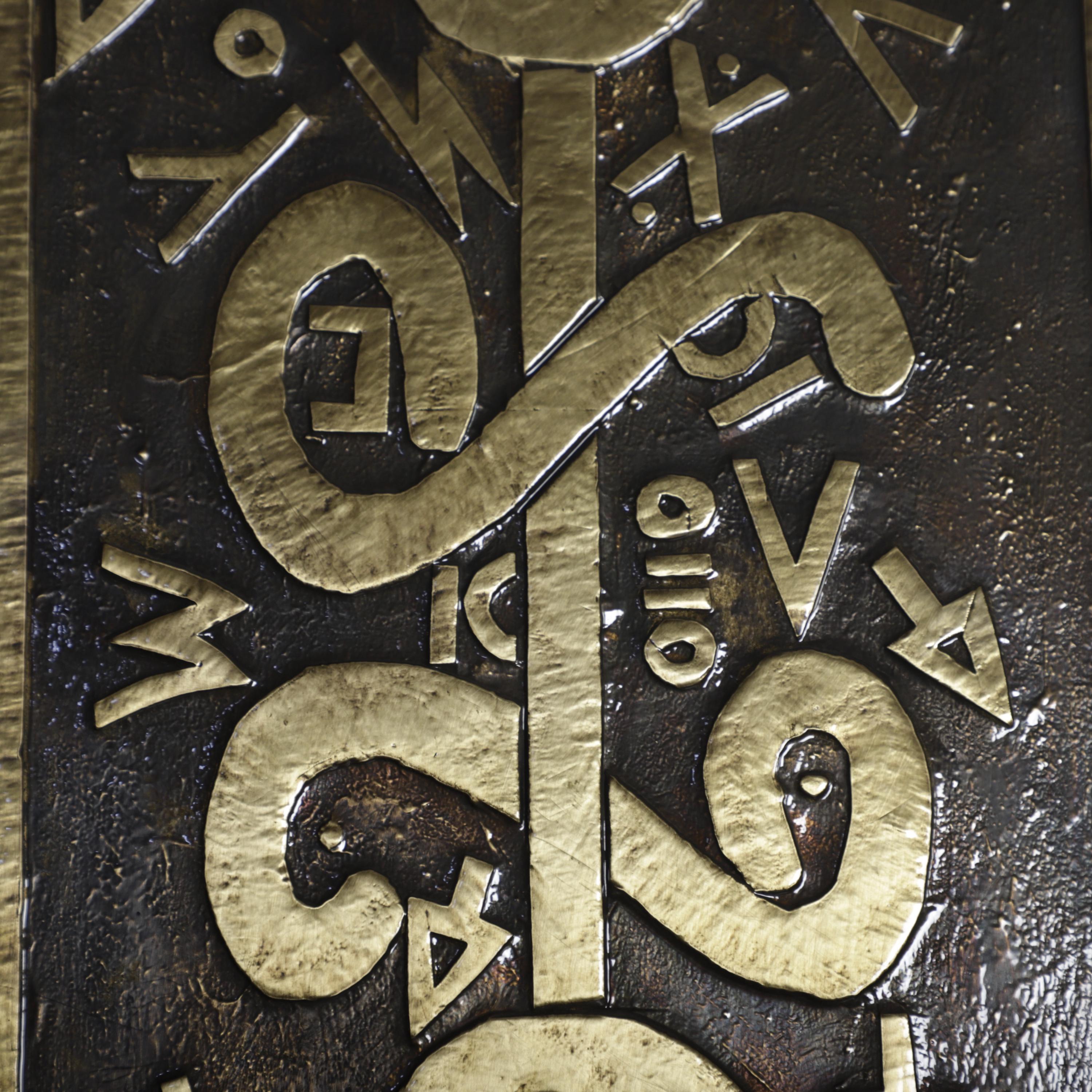 Abstract Brass Wall Art – Tribal Symbolic Design